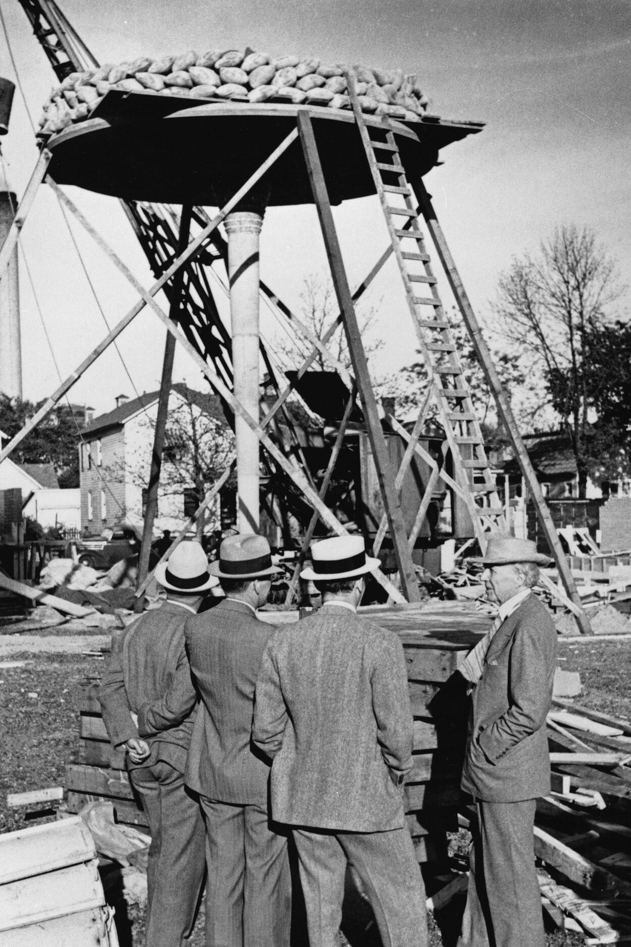 Construction test of reinforced concrete “petal” column, Johnson Wax Building, Racine, Wisconsin, 1936, Frank Lloyd Wright, architect. Wright appears at right. Photo copyright FLW Archives.