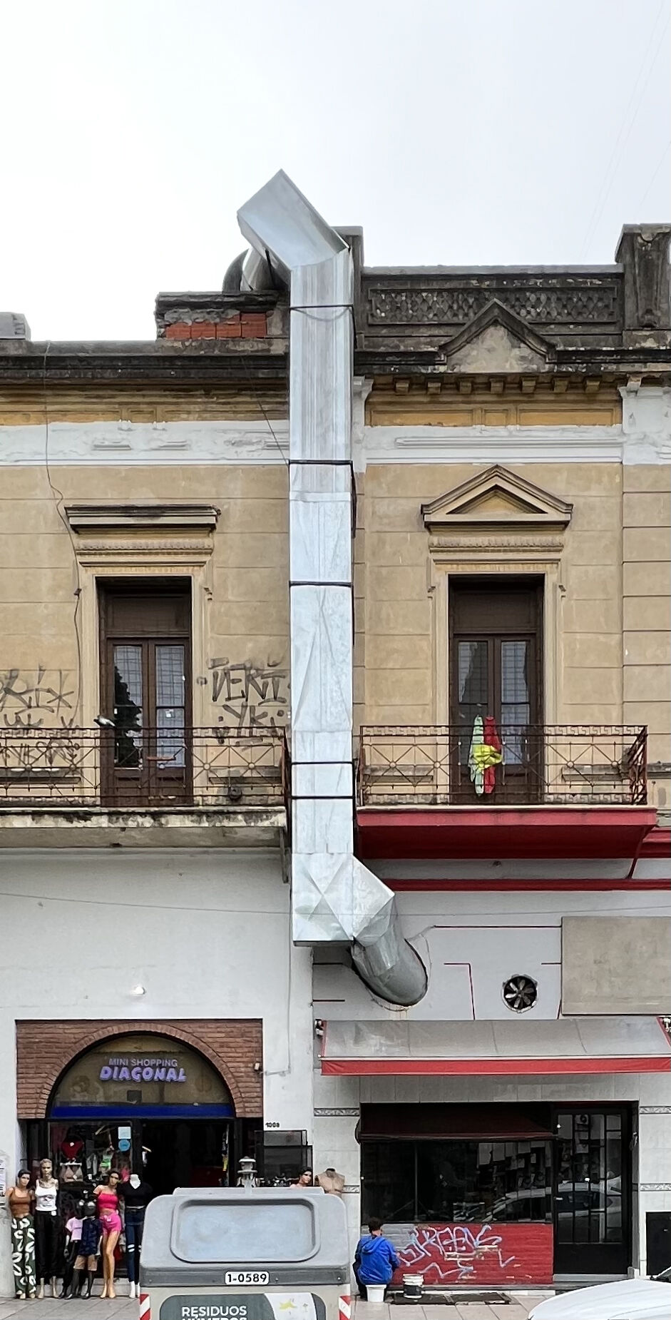 Added exhaust duct for a barbecue shop in La Plata, Argentina. Photo by author.