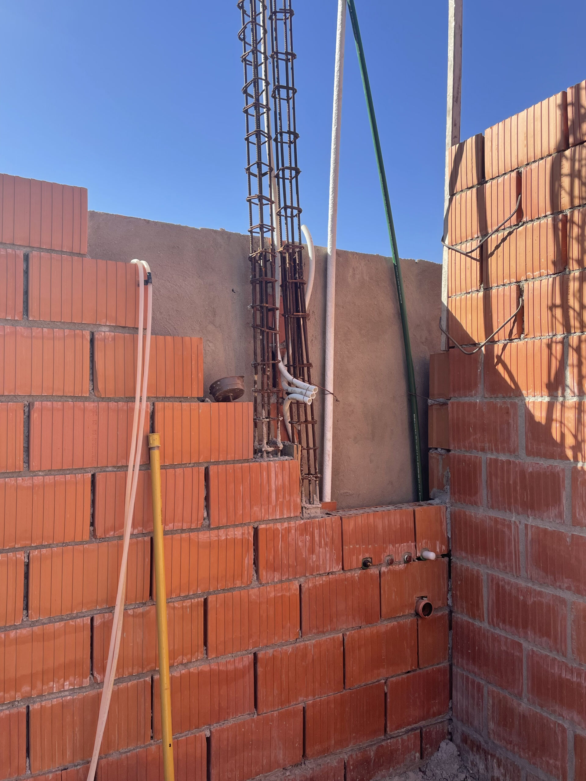 Construction of Ceramic House in Córdoba, Argentina by Agustín Berzero, showing internal cavities for services pipes and ducts. Photo courtesy of Agustín Berzero.